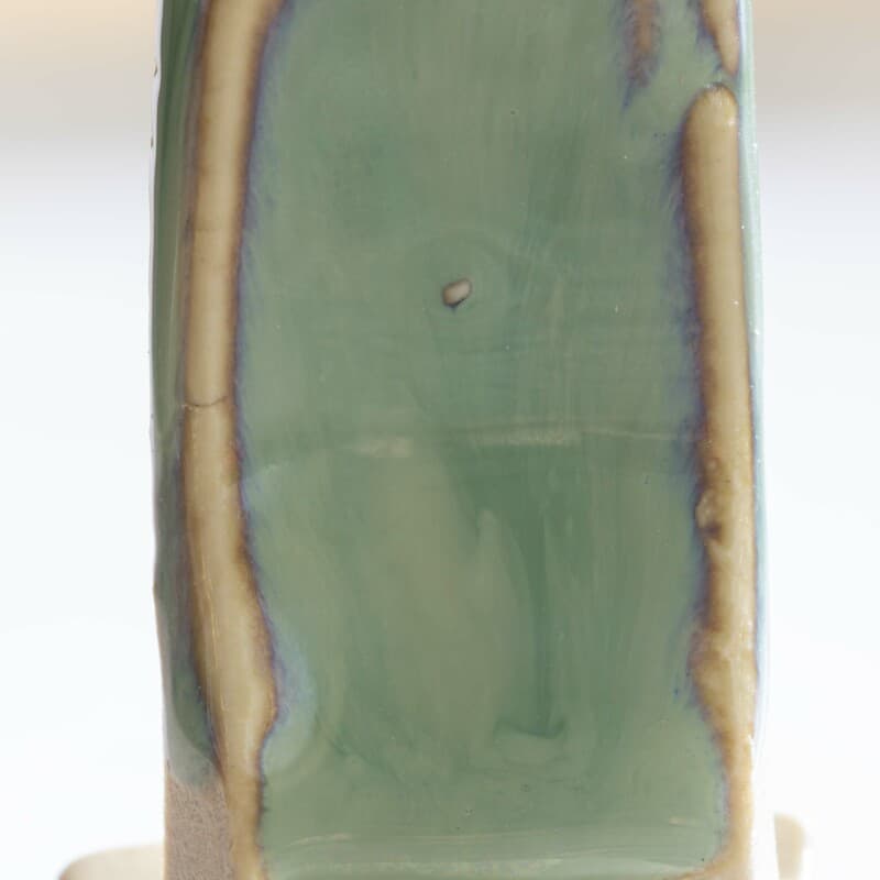 Green titanium glaze