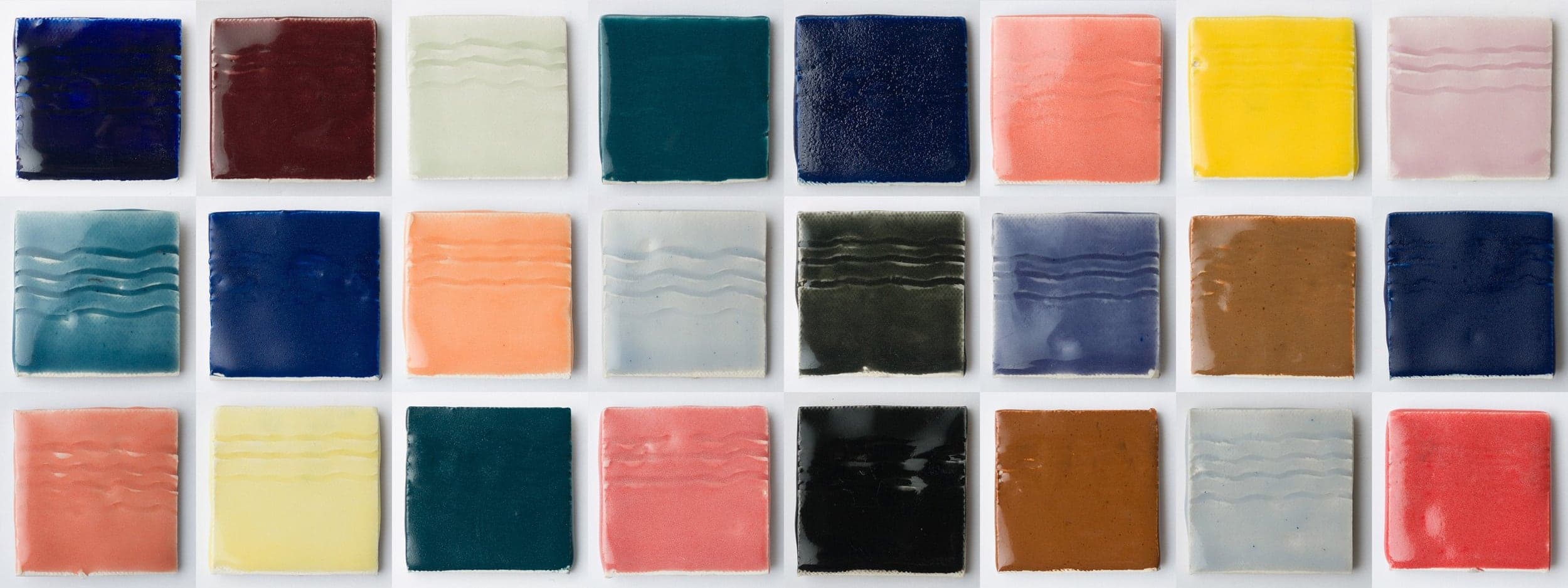 Examples of mason stains added to a clear glaze