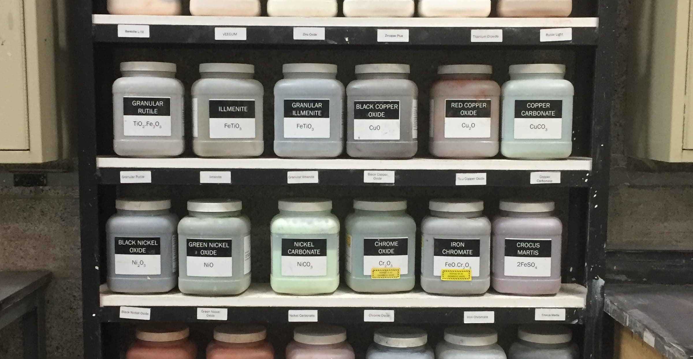 Labeled material containers in Alfred University glaze lab