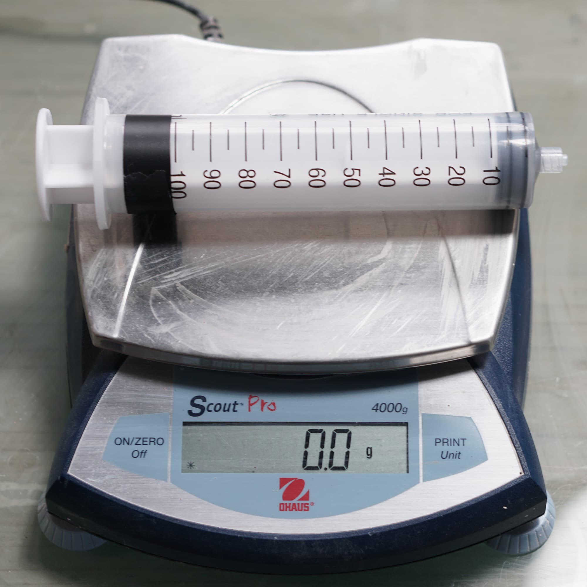 Empty syringe on scale